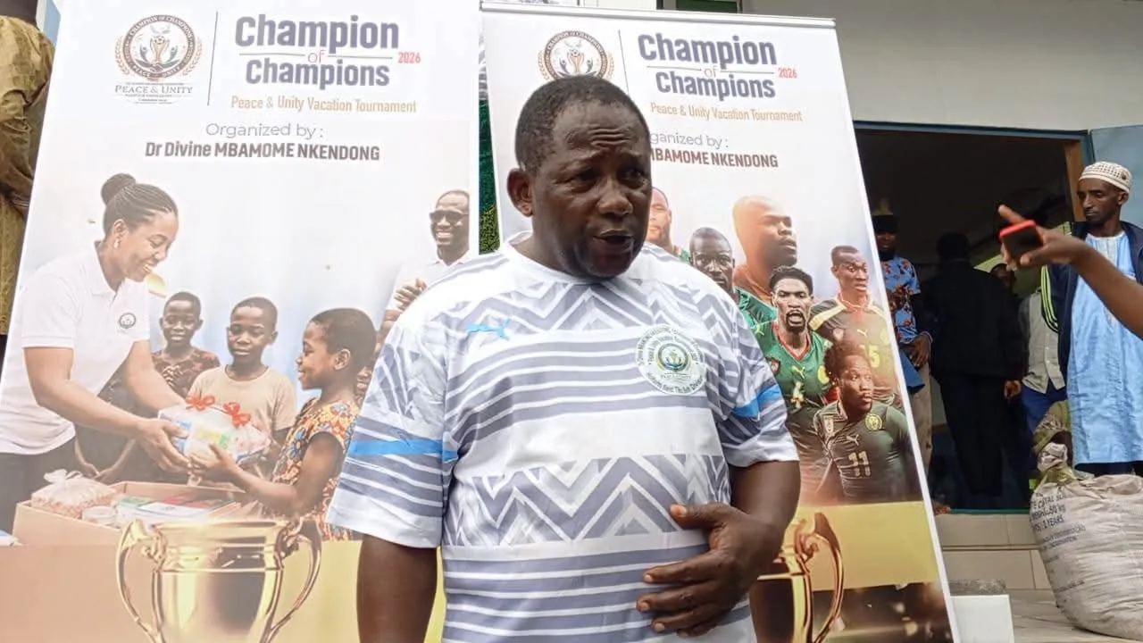 Nkendong, Julius Chembe, President of the Organizing Committee of the Dr. Divine Champion of Champions Jamboree, representative of Dr. Mbamome Divine at the distribtion ceremony d