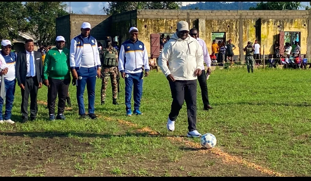 Manyu SDO Alienou Awunfack Yves Bertrand and the cupdornor during the kick off, shortly before the final match